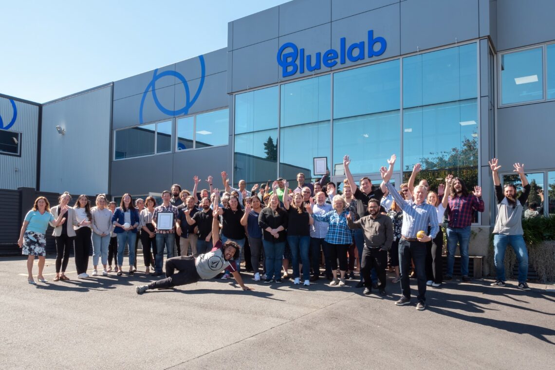 Bluelab team posing in front of their building